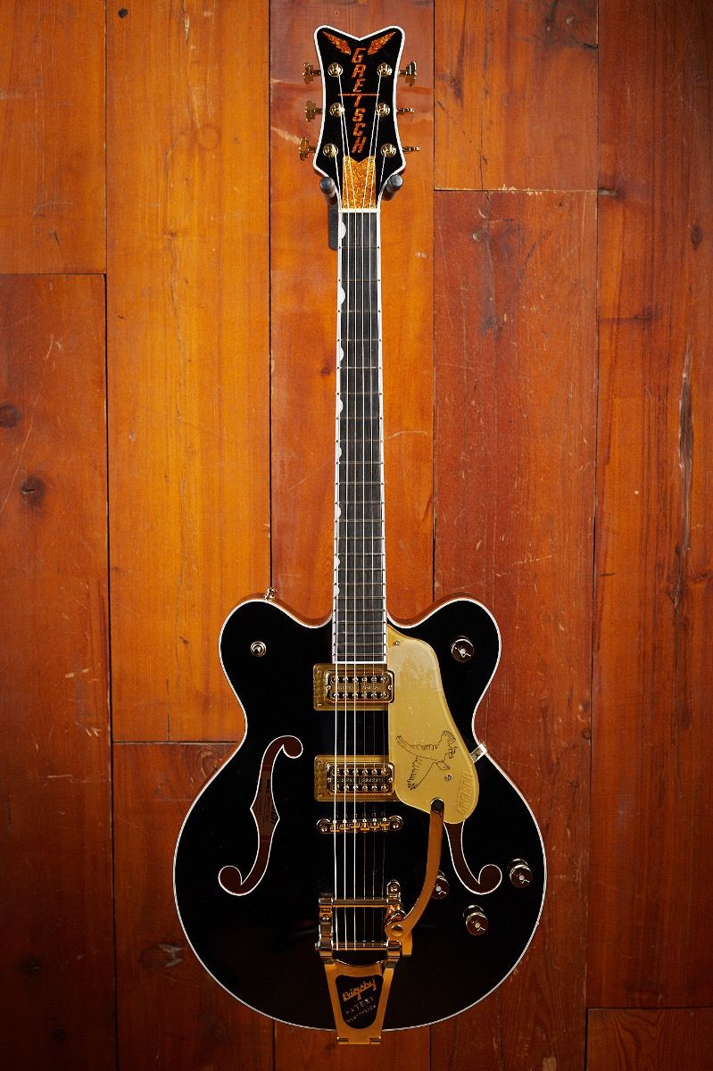 GRETSCH G6636TDC-BLK ダブルカッタウェイ　ブラックファルコン Amazon.com: Gretsch G6636T Players Edition Falcon Center